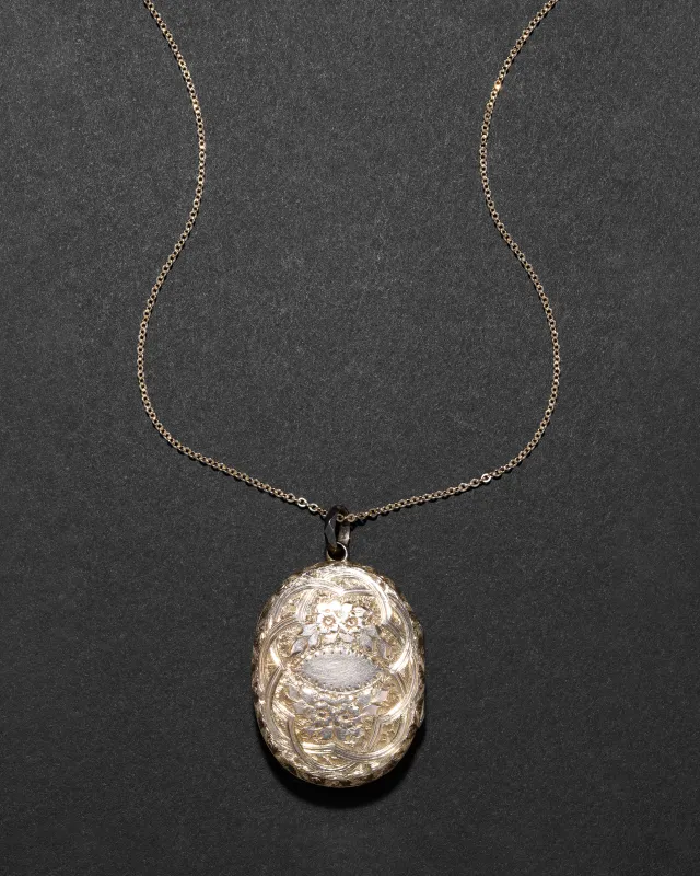 Antique Victorian 1800s 9k Gold Hand Etched Locket Necklace with Faceted Bale sold by Alexis Bittar