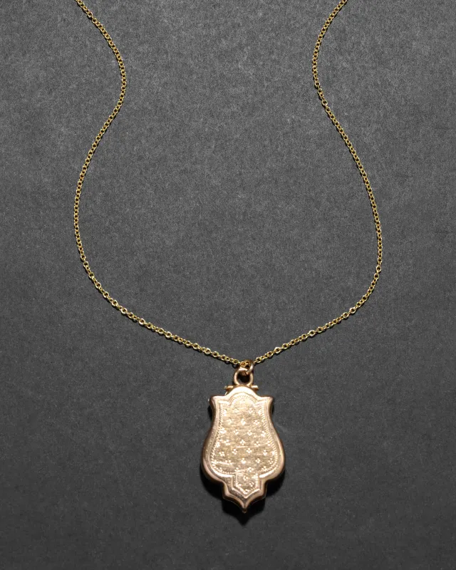Antique 1910s 14k Gold Hand Etched Unique Shape Locket Pendant Necklace sold by Alexis Bittar