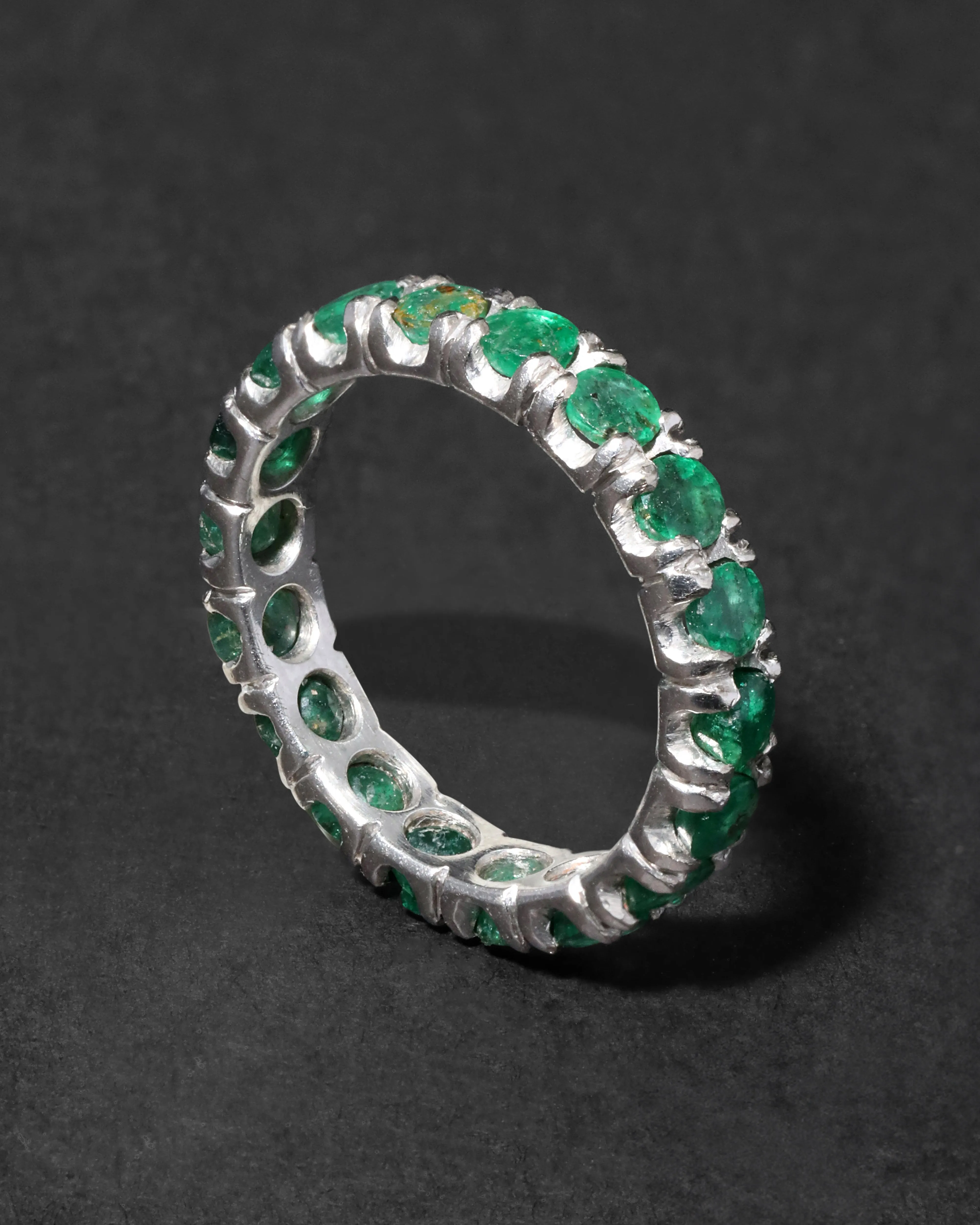 Vintage 14k White Gold & Emerald Eternity Band sold by Alexis Bittar