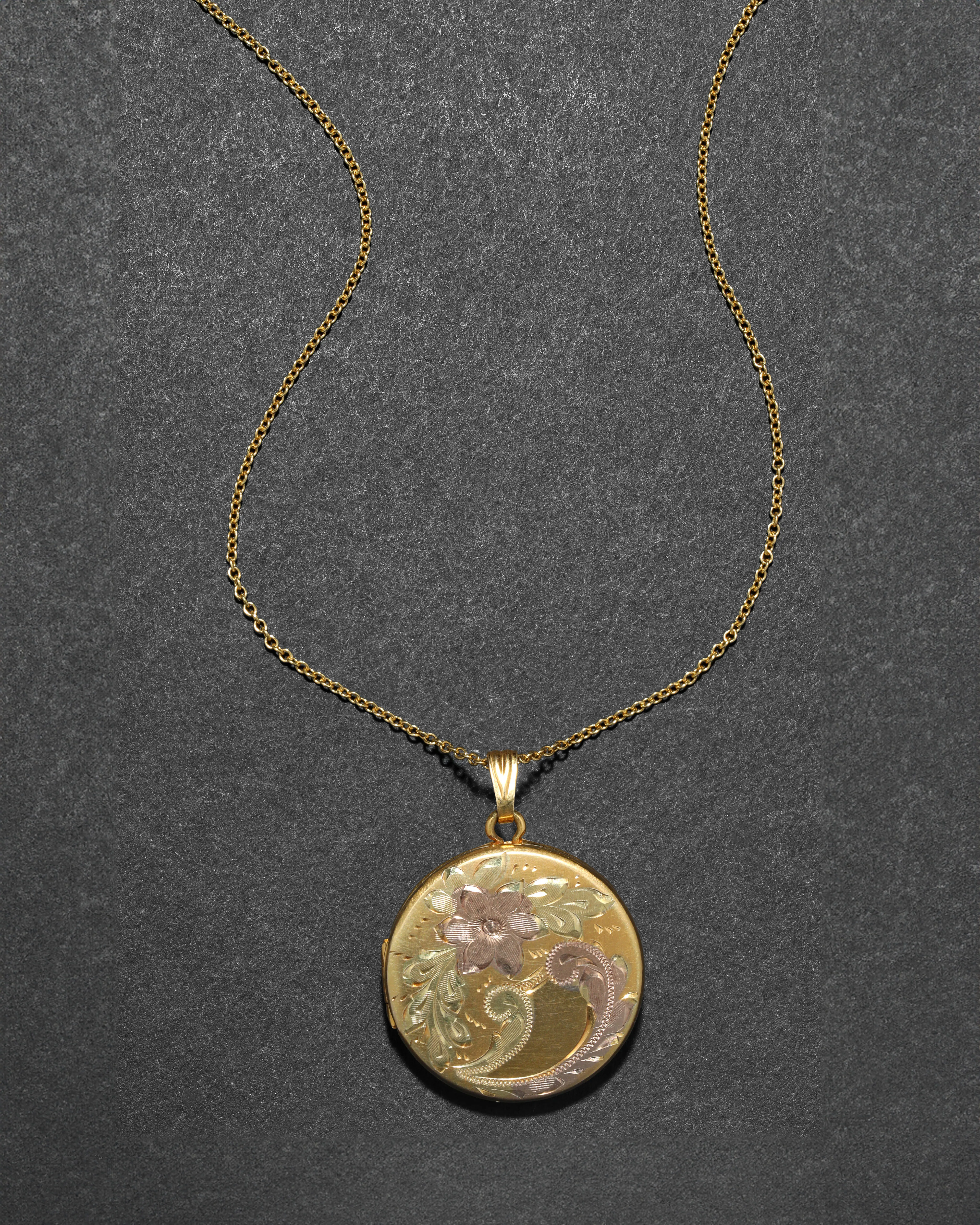 Vintage 1960s 12k Gold Filled Three Tone Floral Etched Locket Necklace sold by Alexis Bittar