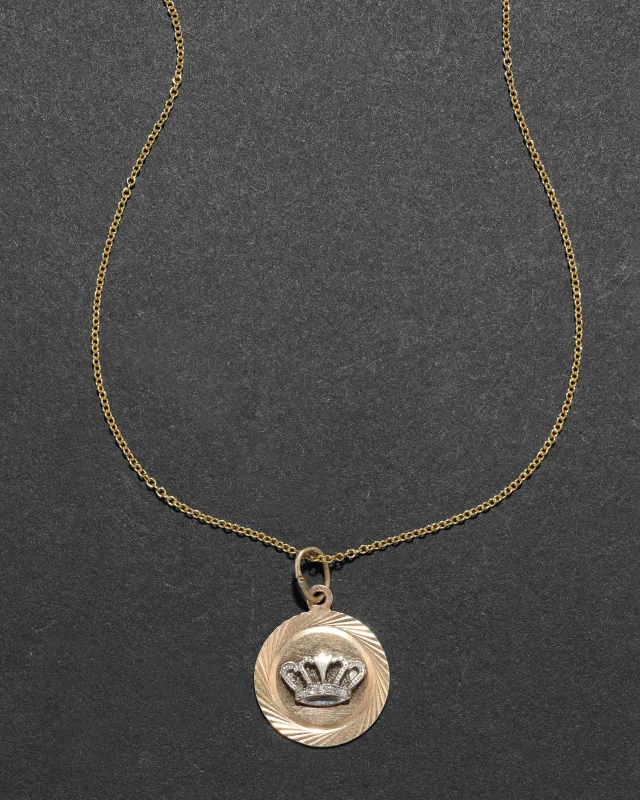 Vintage 1920s 14k Yellow & White Two Tone Gold Crown Pendant Necklace sold by Alexis Bittar
