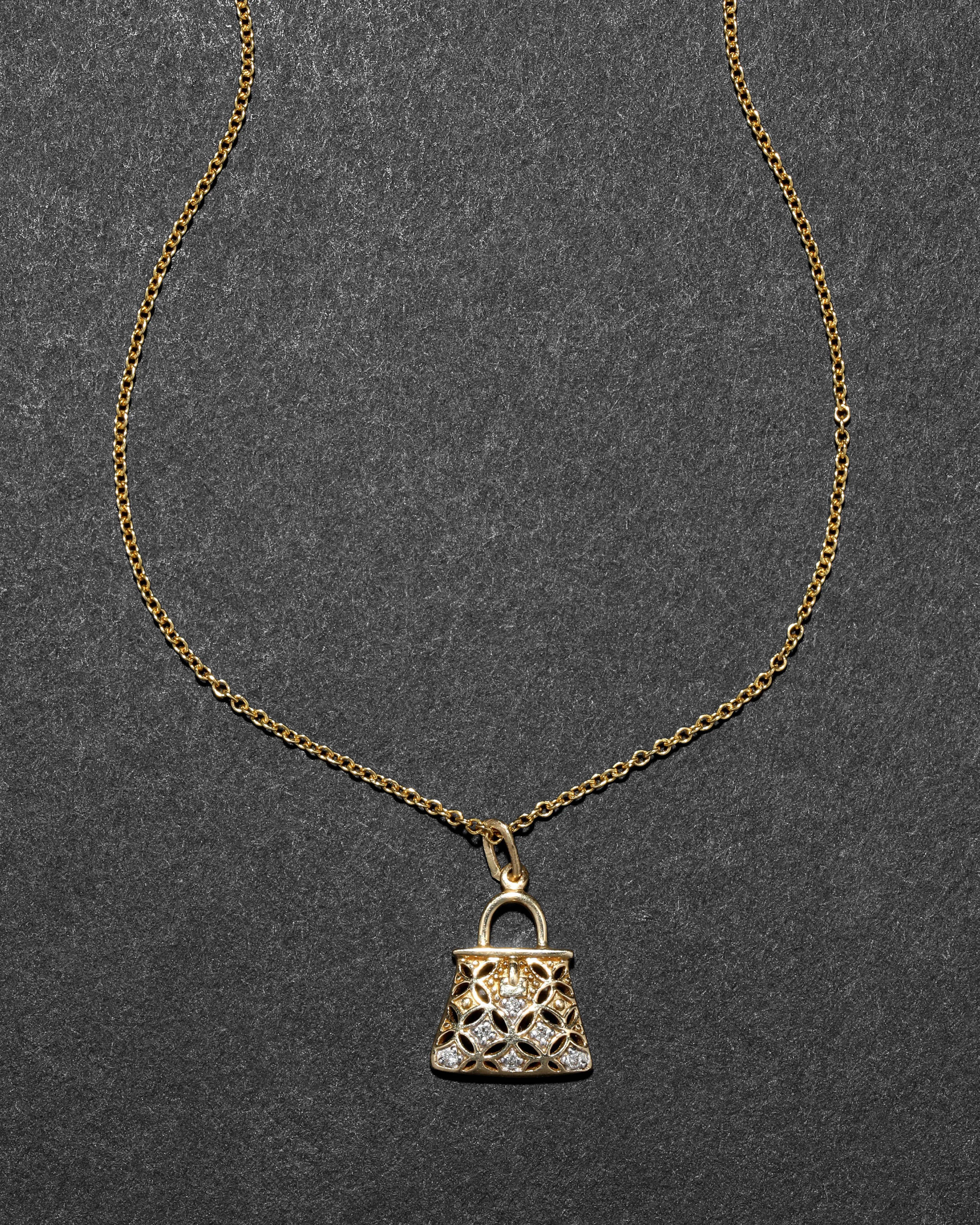 Vintage 14k Yellow & White Two Tone Gold with Diamond Accent Purse Pendant Necklace sold by Alexis Bittar