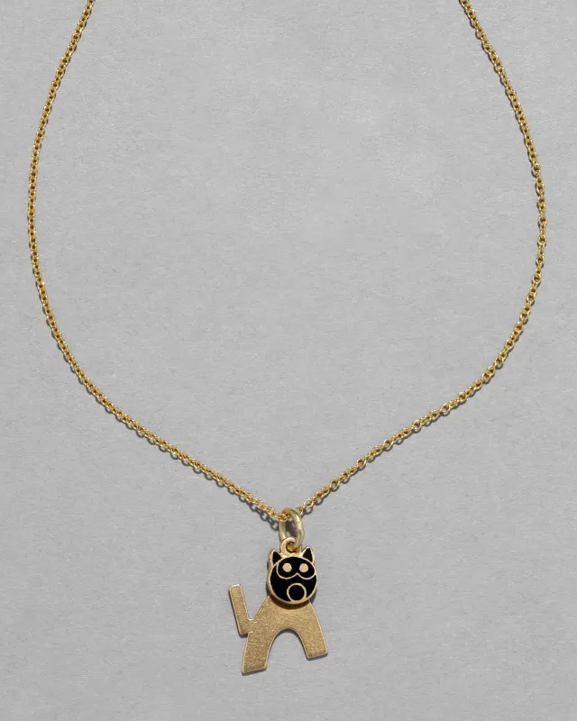 Vintage 1930s 14k Gold Deco Black Enamel Articulated Cat Pendant Necklace sold by Alexis Bittar
