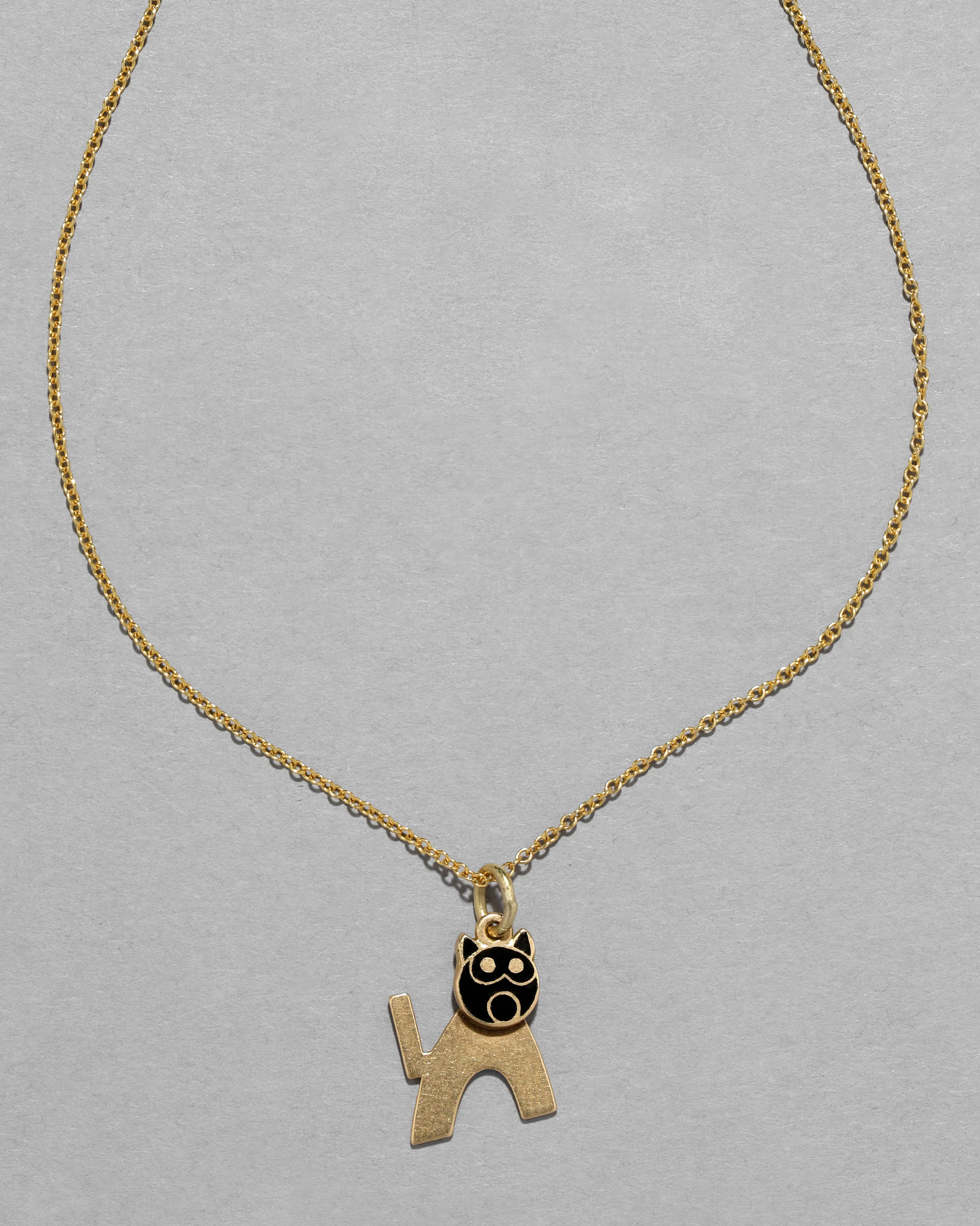 Vintage 1930s 14k Gold Deco Black Enamel Articulated Cat Pendant Necklace sold by Alexis Bittar