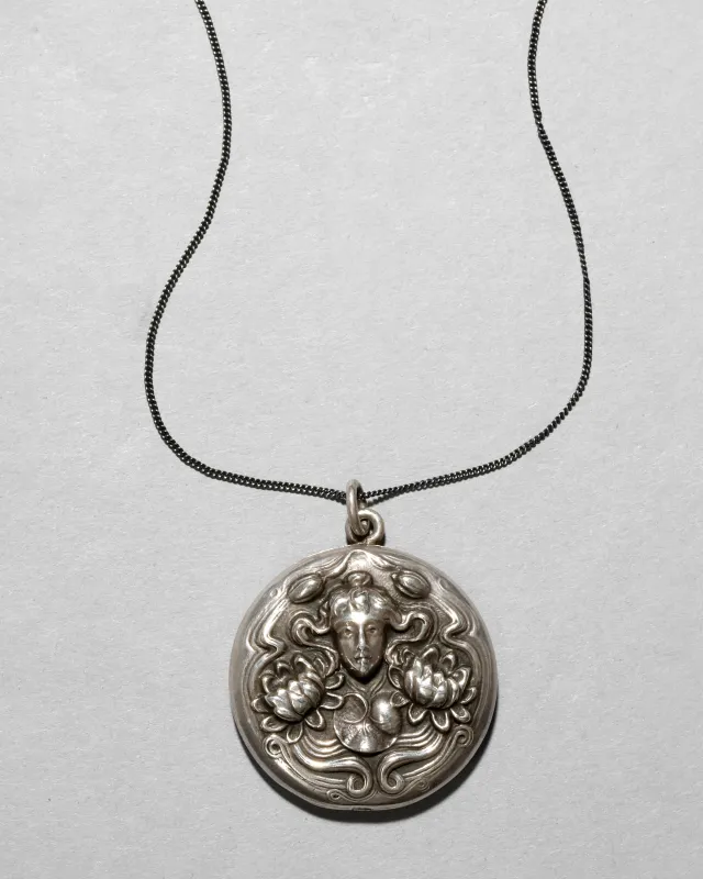 Antique Late 1800s Sterling Silver Art Nouveau Locket Necklace sold by Alexis Bittar
