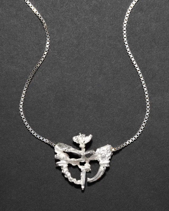 Vintage 1980s Sterling Silver Sculptural Pendant Necklace sold by Alexis Bittar