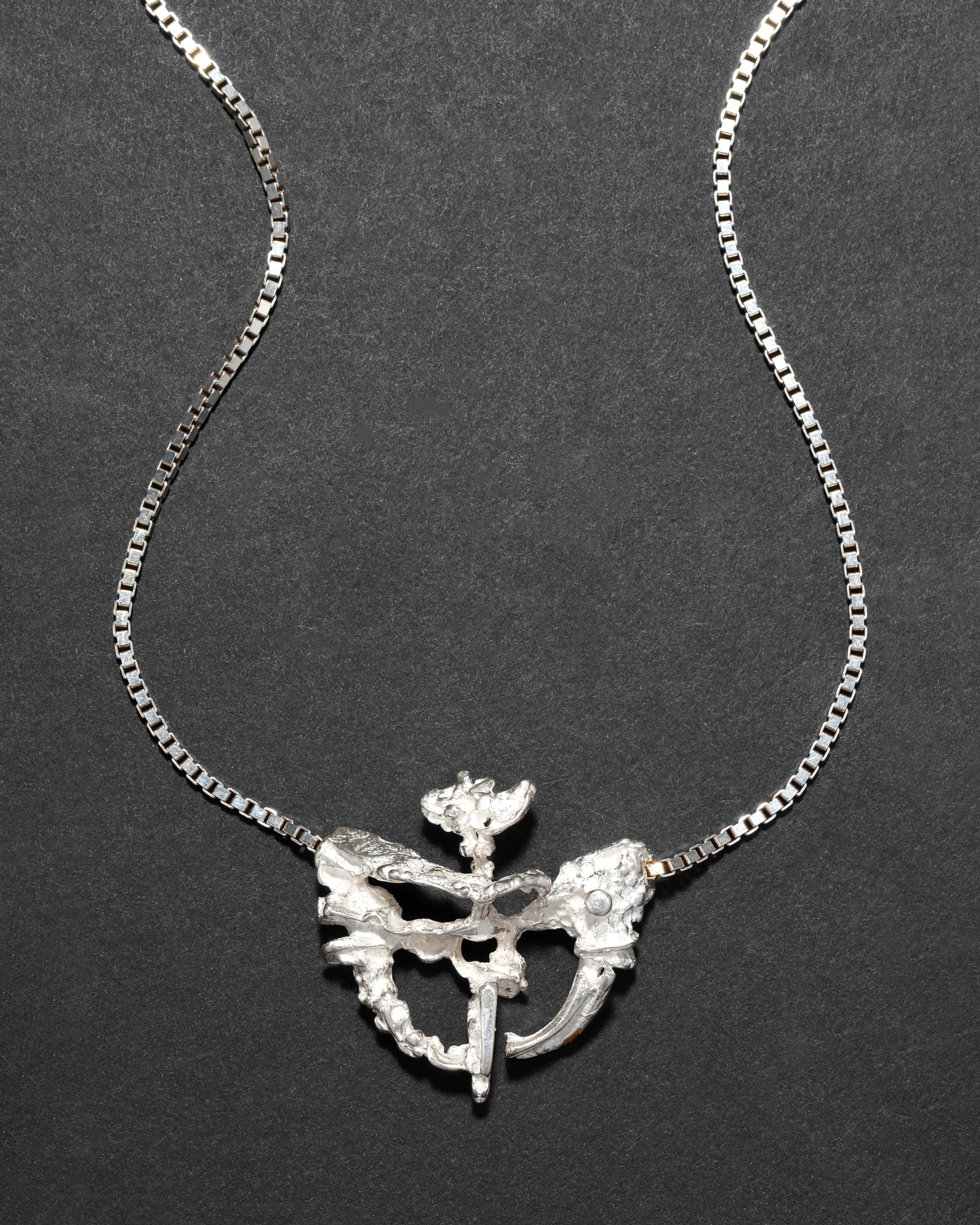 Vintage 1980s Sterling Silver Sculptural Pendant Necklace sold by Alexis Bittar