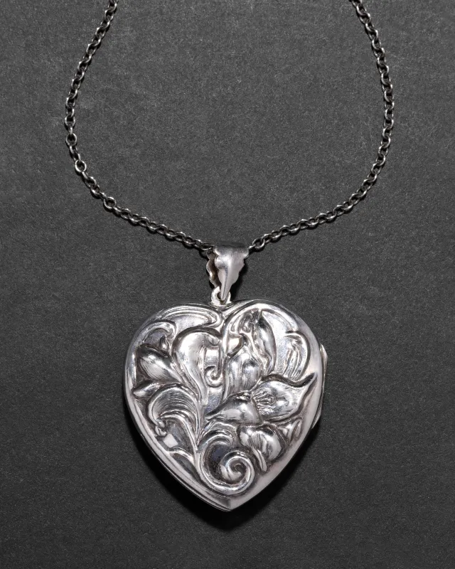 Antique Late 1800s Sterling Silver Art Nouveau Heart Locket Necklace sold by Alexis Bittar