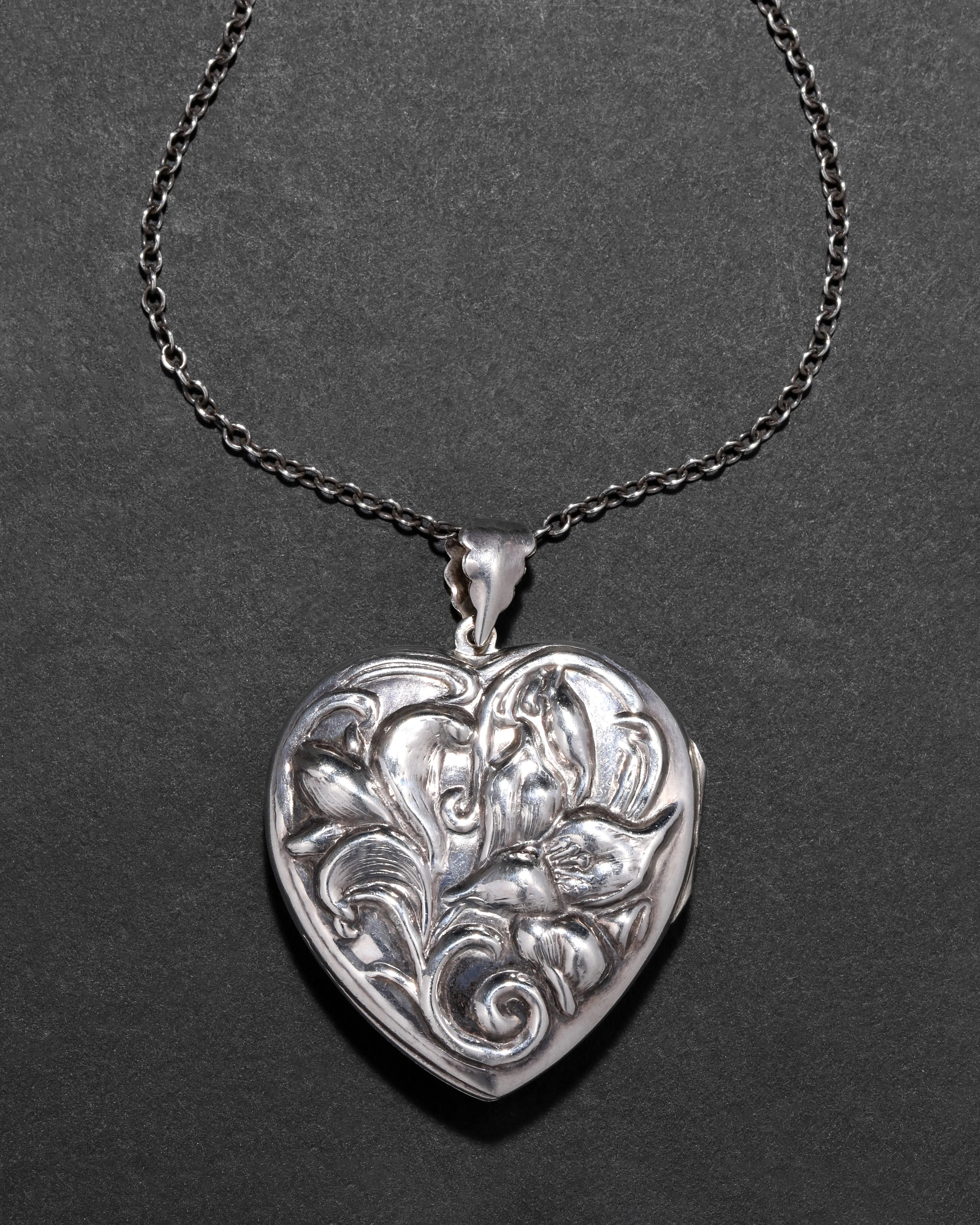 Antique Late 1800s Sterling Silver Art Nouveau Heart Locket Necklace sold by Alexis Bittar