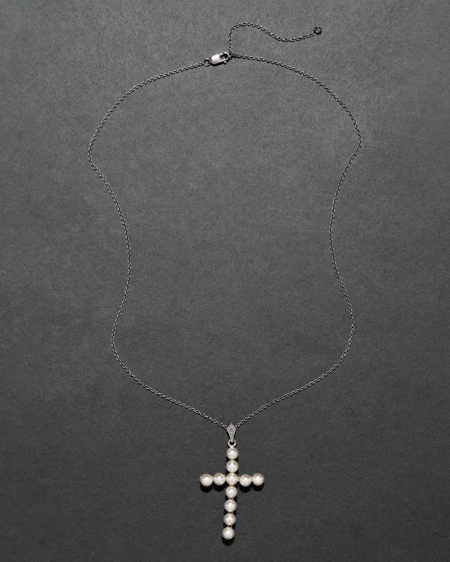 Vintage 1970s Sterling Silver & Natural Pearl Cross Pendant Necklace sold by Alexis Bittar