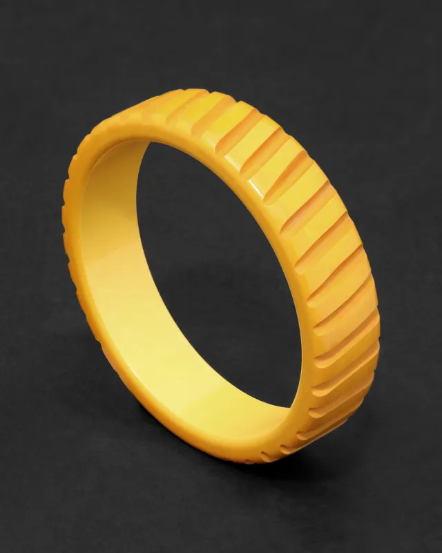 Vintage 1930s Bakelite Hand Carved Wide Ribbed Bangle Bracelet sold by Alexis Bittar