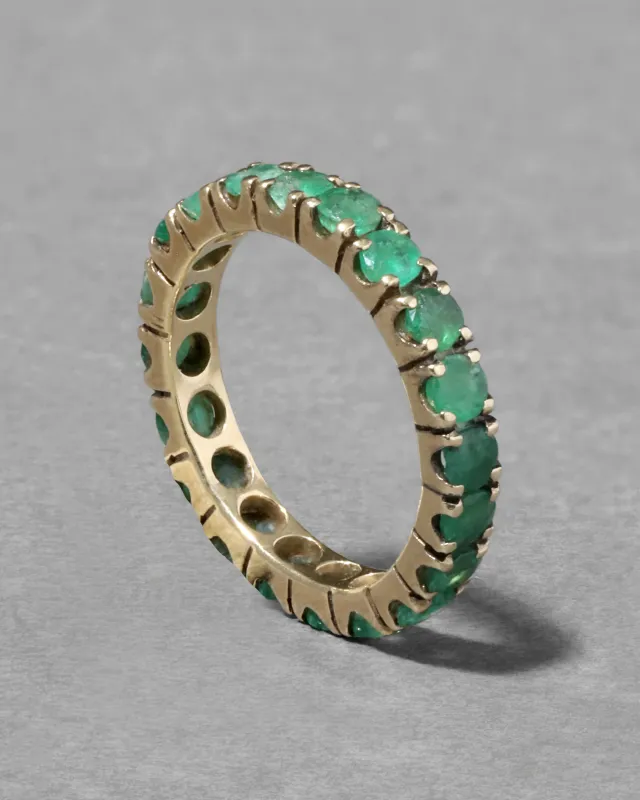 Vintage 1970s 14k Gold Custom Made Emerald Eternity Band Ring sold by Alexis Bittar