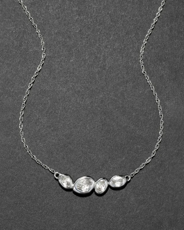 Molten Silver Crystal Station Necklace sold by Alexis Bittar