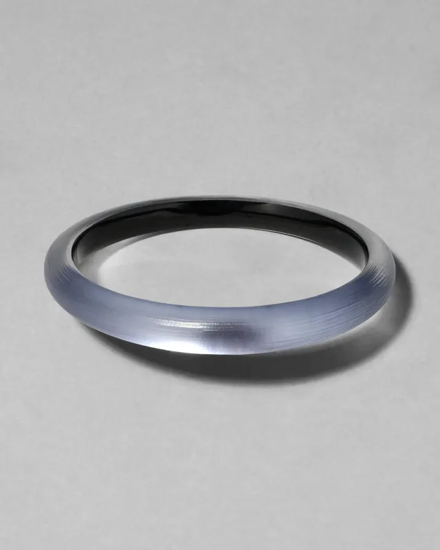 Lucite Skinny Bangle- Steel Blue sold by Alexis Bittar