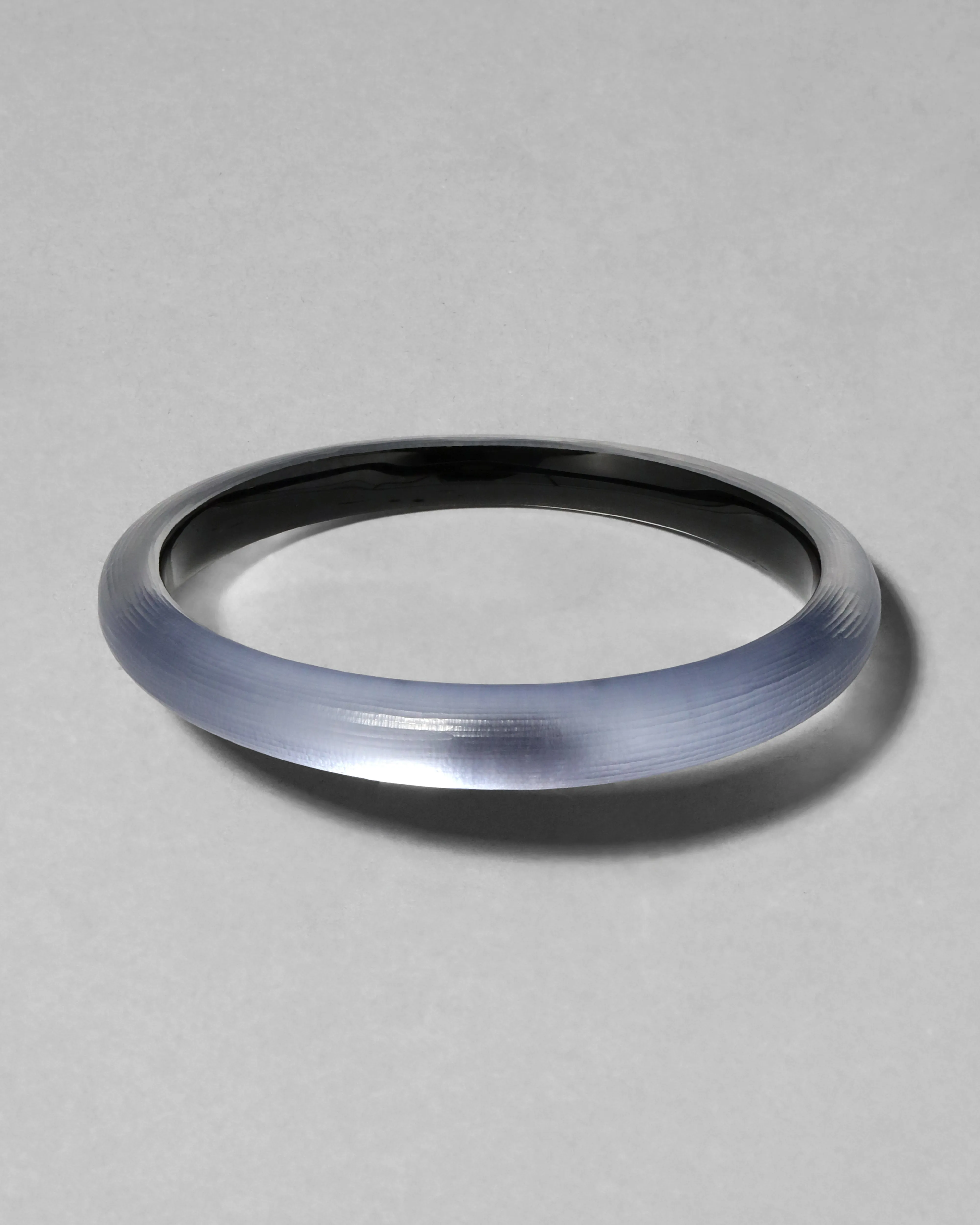 Lucite Skinny Bangle- Steel Blue sold by Alexis Bittar