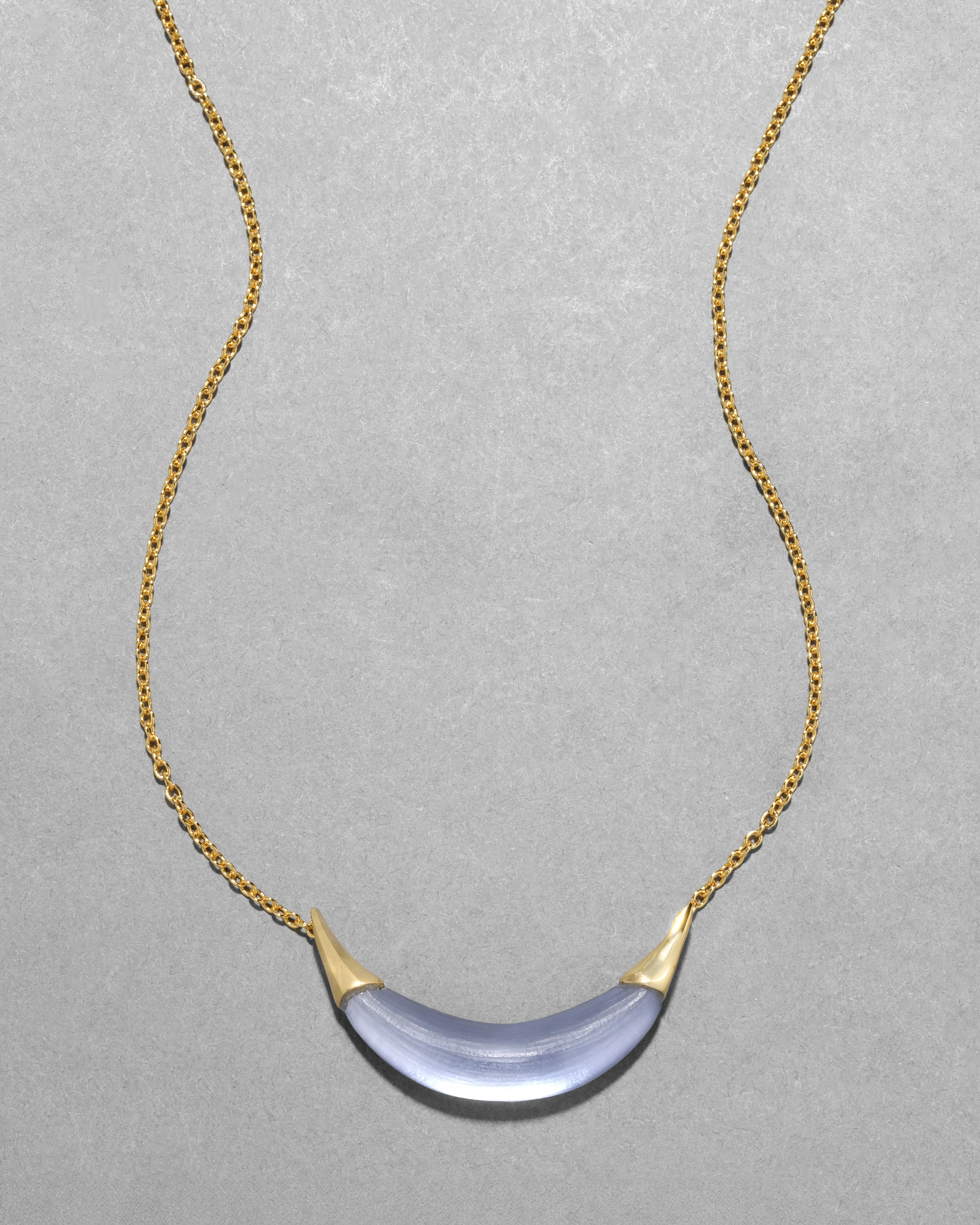 Gold Capped Crescent Lucite Necklace- Steel Blue sold by Alexis Bittar