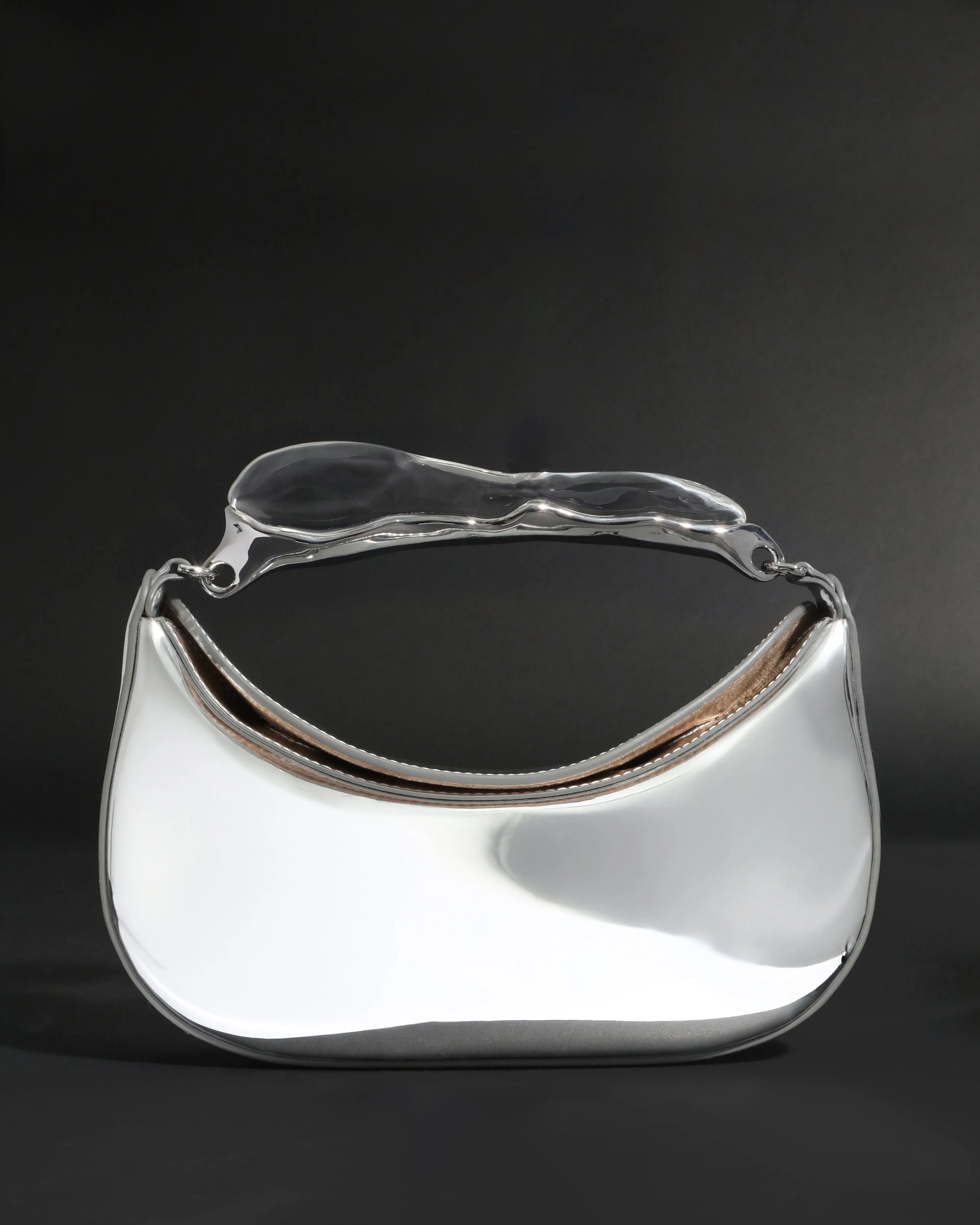 Water Stone Top Handle Clutch- Chrome sold by Alexis Bittar