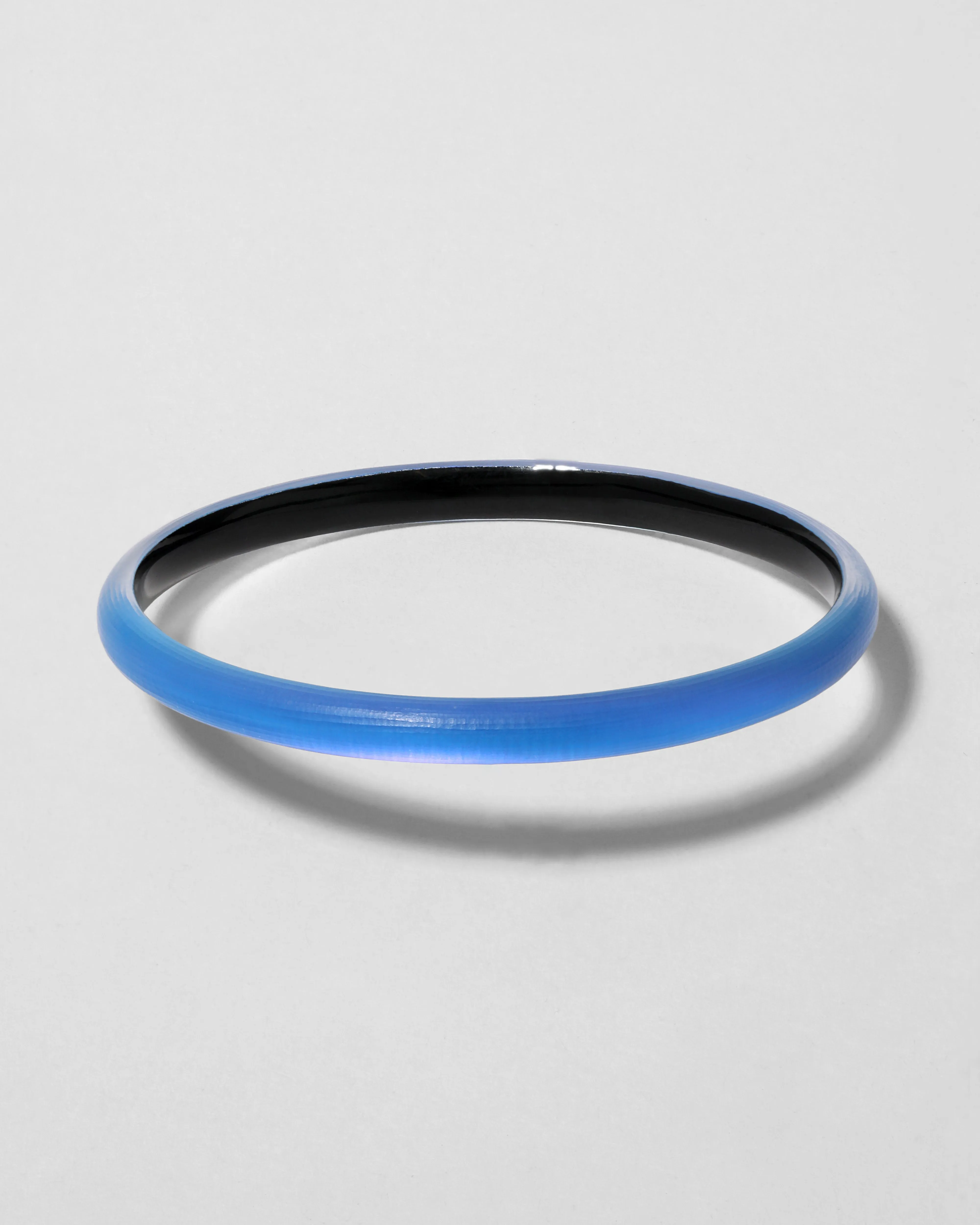 Luminous Lucite Super Skinny Bangle Bracelet- Hyacinth sold by Alexis Bittar