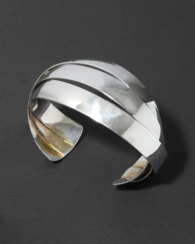 Vintage 1980s Sterling Silver Handmade Orbiting Ribbon Cuff Bracelet made by Alexis Bittar