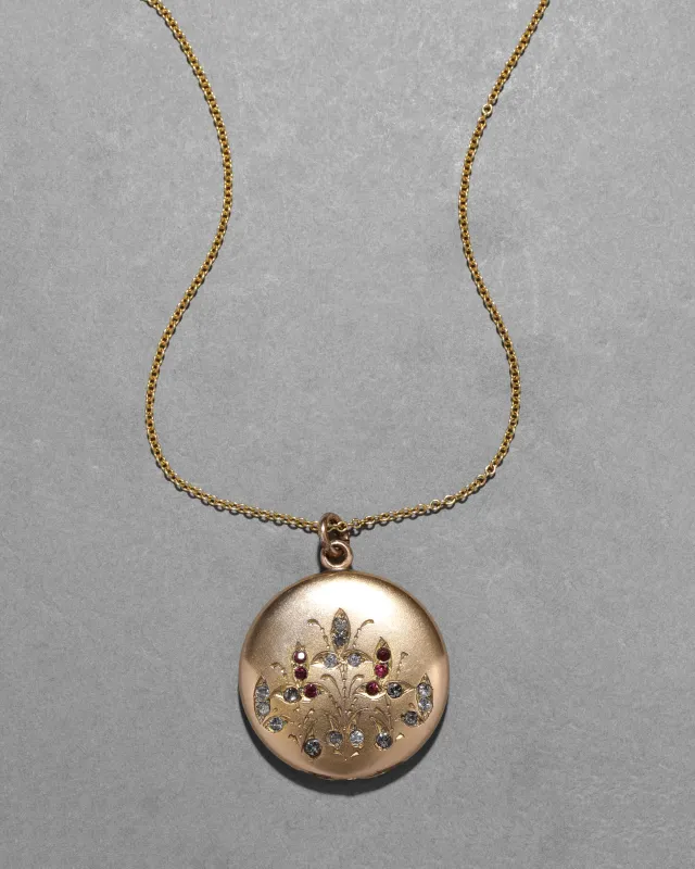 Antique 1910s 14k Gold Fill & Crystal Embellished Floral Motif Locket Necklace made by Alexis Bittar