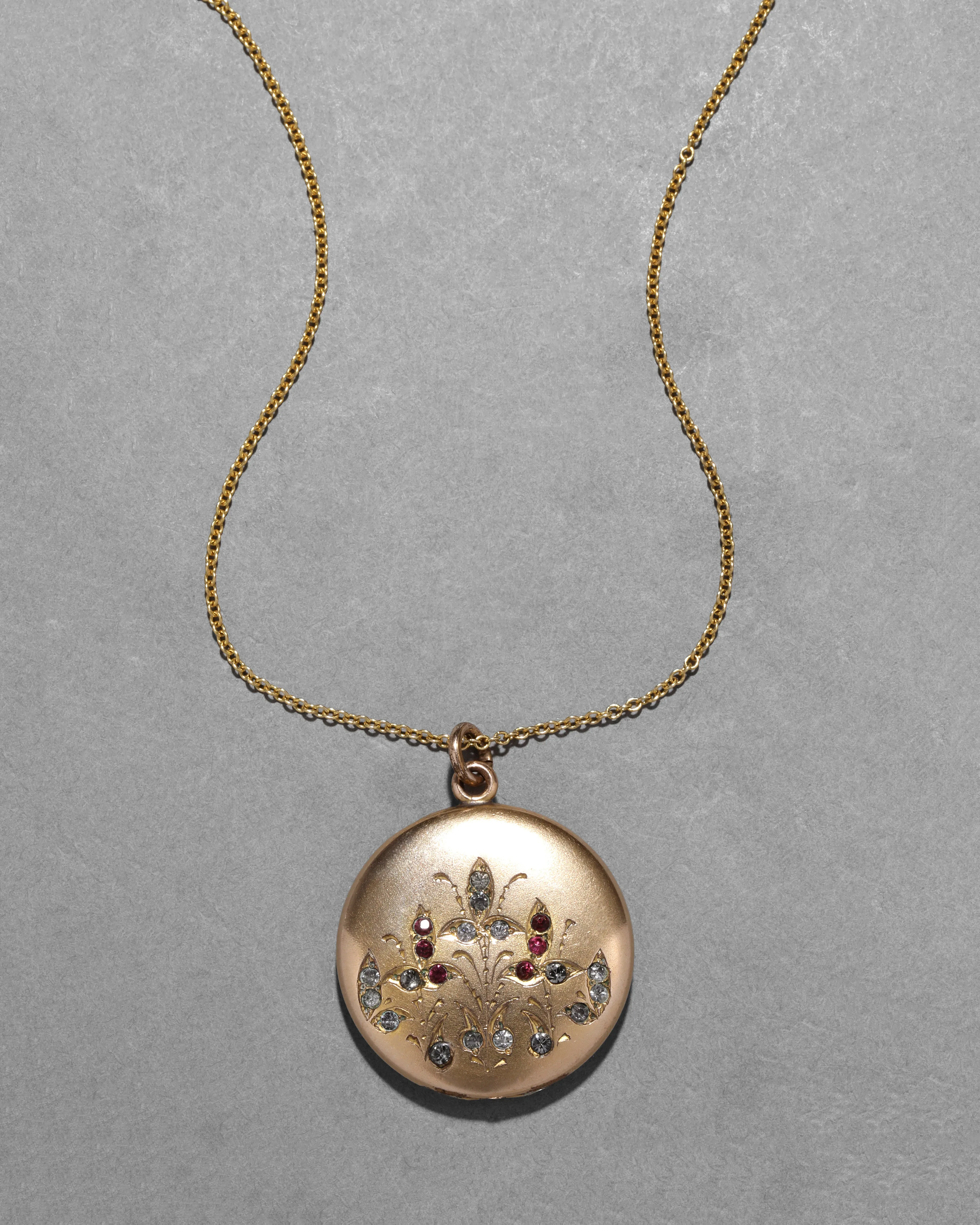 Antique 1910s 14k Gold Fill & Crystal Embellished Floral Motif Locket Necklace sold by Alexis Bittar