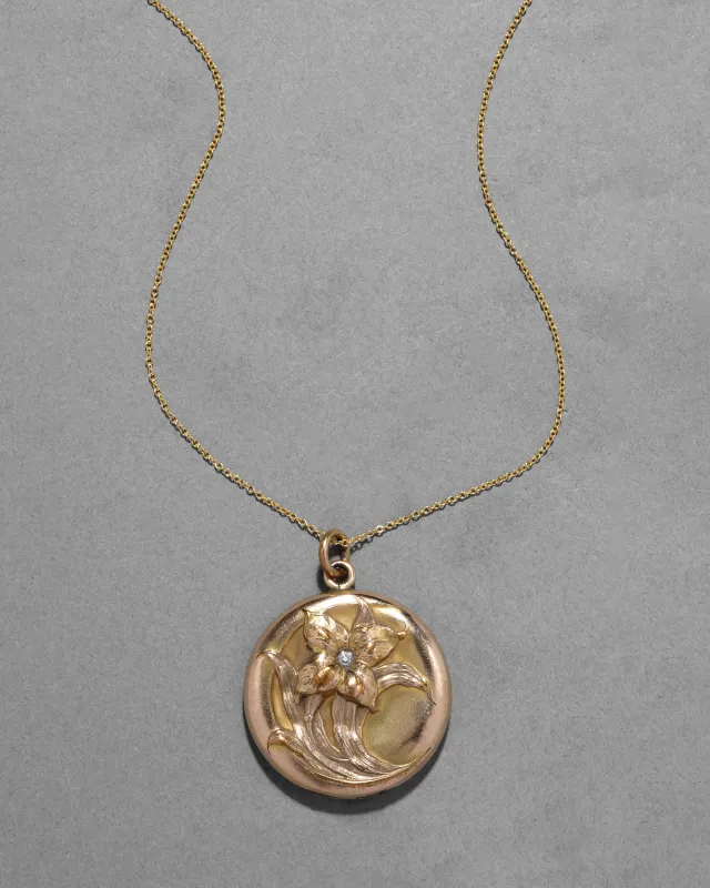 Antique 1890s 14k Gold Fill Large Repousse Flower Locket Necklace sold by Alexis Bittar