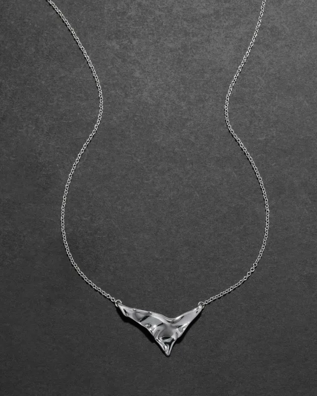 Molten Silver Shield Pendant Necklace made by Alexis Bittar