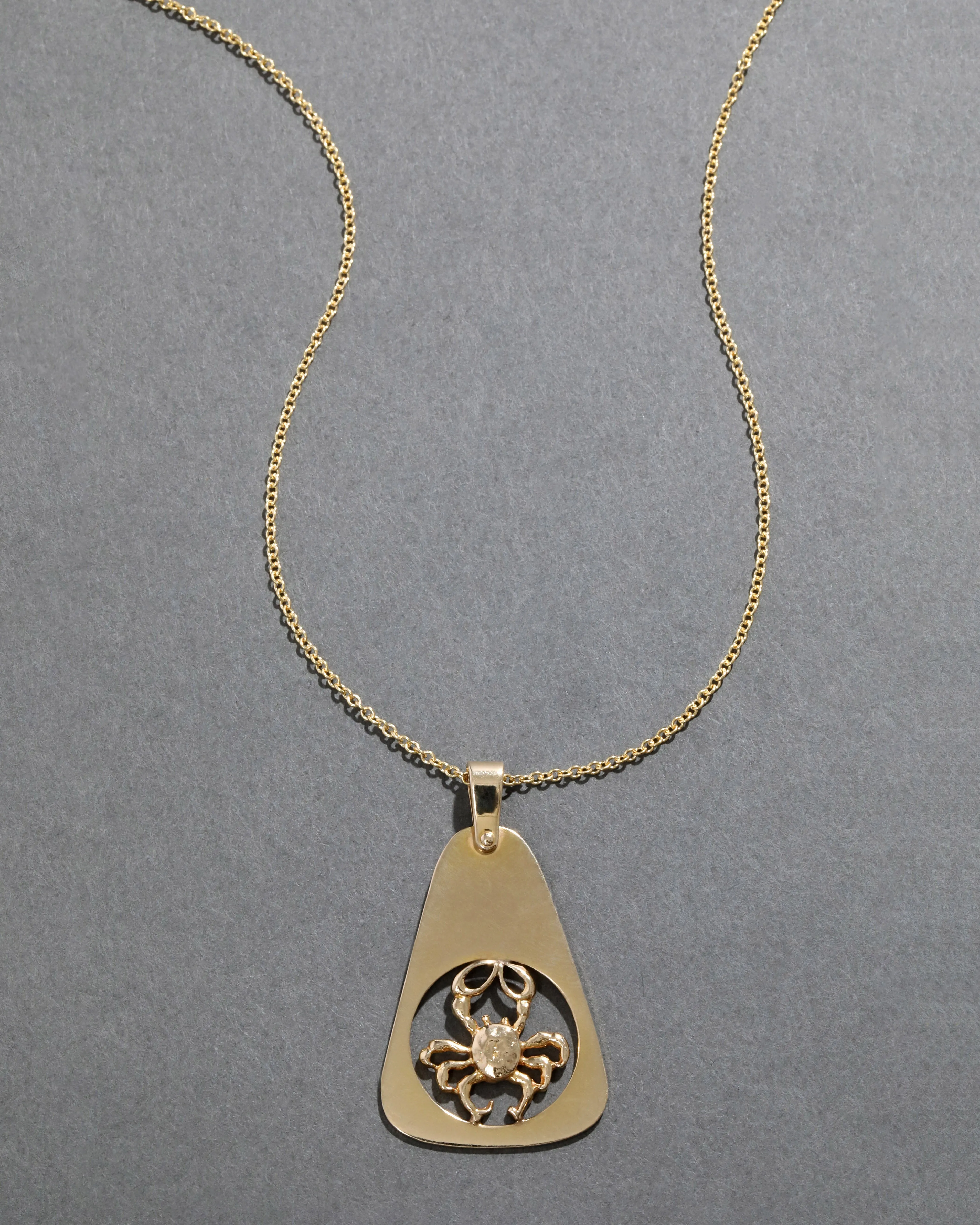 Vintage 1970s 14k Gold Cancer Zodiac Pendant Necklace sold by Alexis Bittar