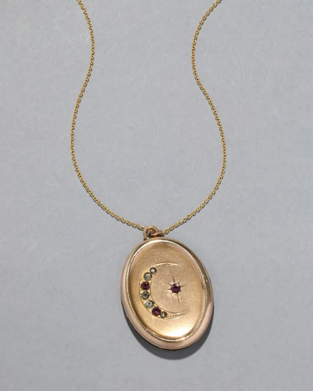 Antique Victorian 14k Gold Filled Crescent Moon and Star Oval Locket Necklace sold by Alexis Bittar