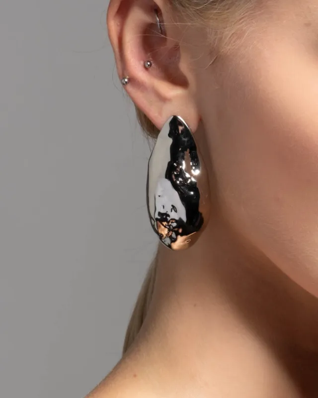 Molten Silver Puffy Teardrop Post Earring sold by Alexis Bittar