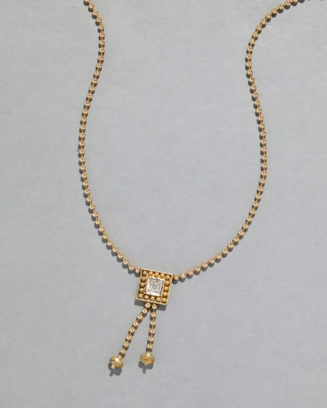 Vintage 1990s 14k Gold Tassel Diamond Ball Chain Necklace sold by Alexis Bittar