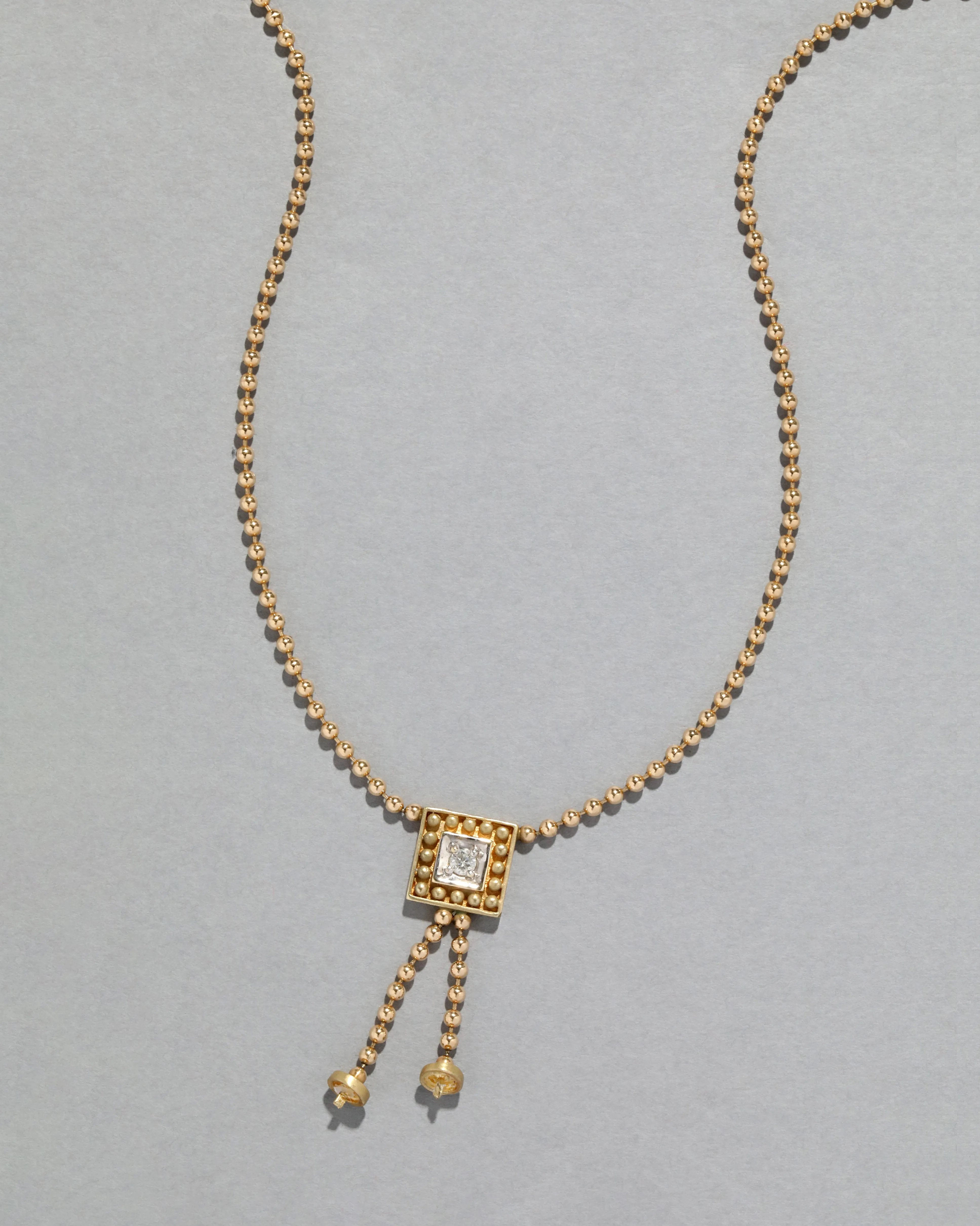 Vintage 1990s 14k Gold Tassel Diamond Ball Chain Necklace sold by Alexis Bittar