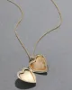 Vintage 1950s 12k Gold FIlled Engraved Heart Locket Necklace sold by Alexis Bittar