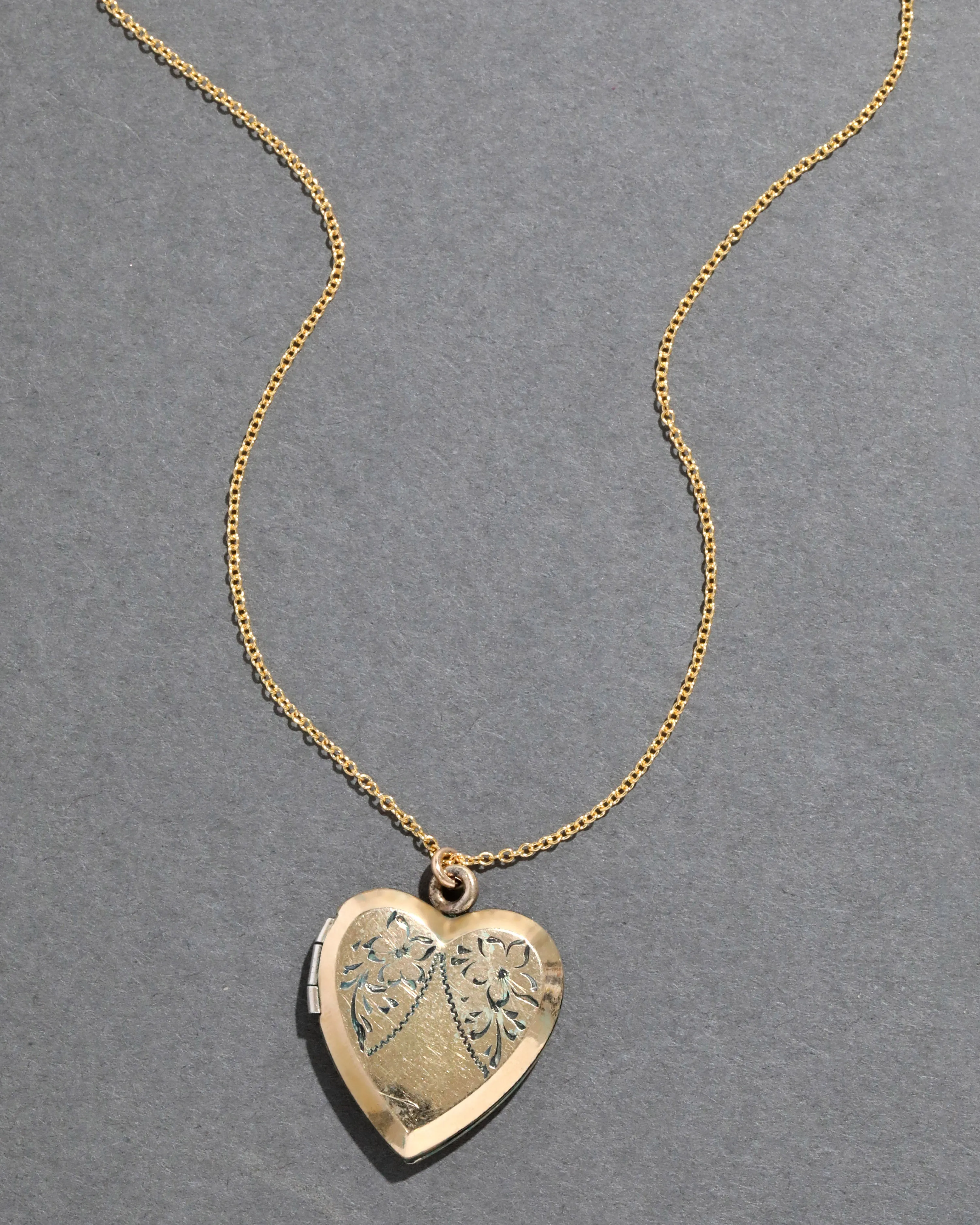 Vintage 1950s 12k Gold FIlled Engraved Heart Locket Necklace sold by Alexis Bittar