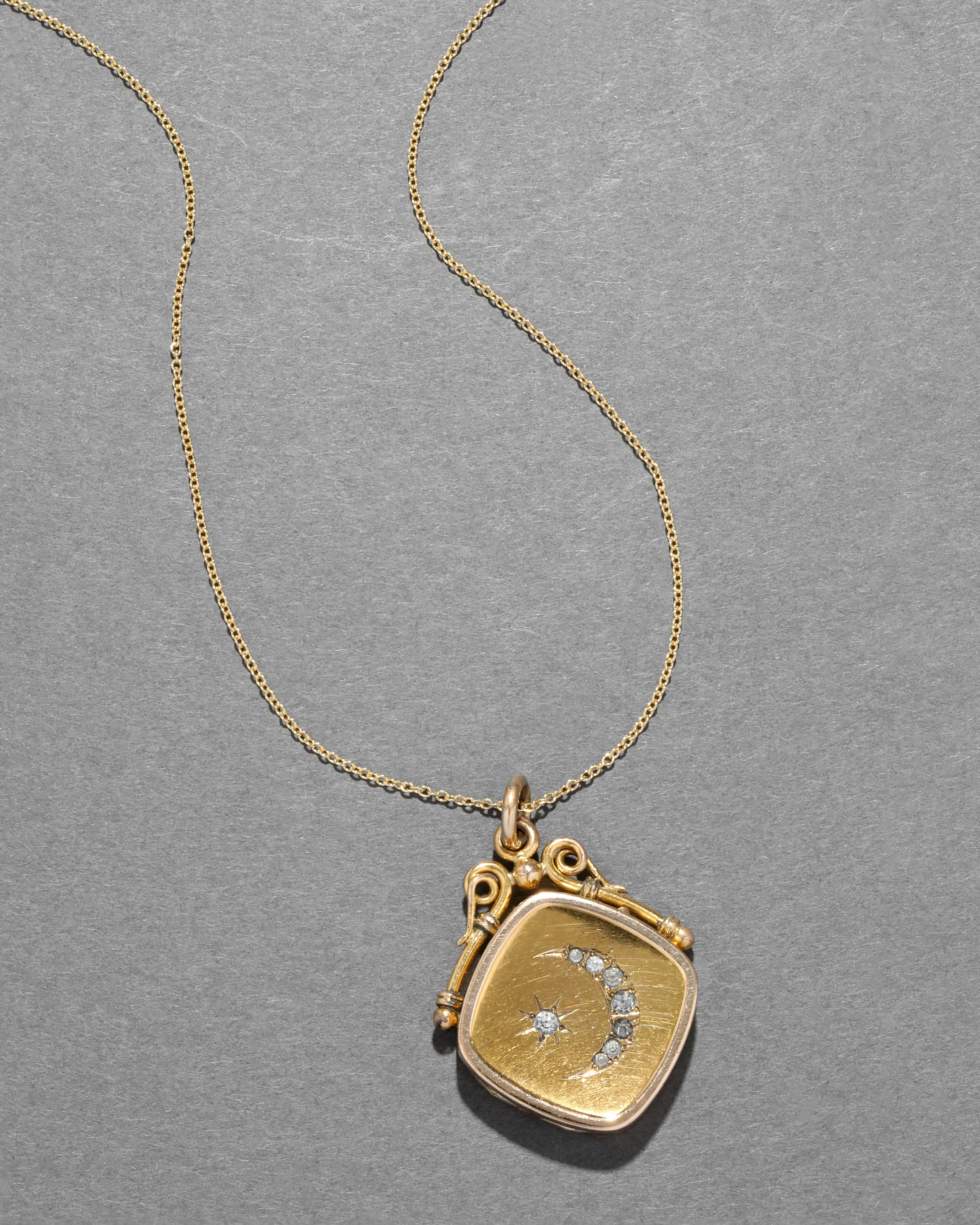 Antique Victorian 1880s 14k Gold Filled Crescent Moon & Star Locket Necklace sold by Alexis Bittar