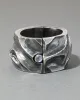 Vintage 1960s Sterling Silver Repousse & Moonstone Hinge Cuff Bracelet sold by Alexis Bittar