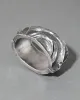 Vintage 1960s Sterling Silver Repousse & Moonstone Hinge Cuff Bracelet sold by Alexis Bittar