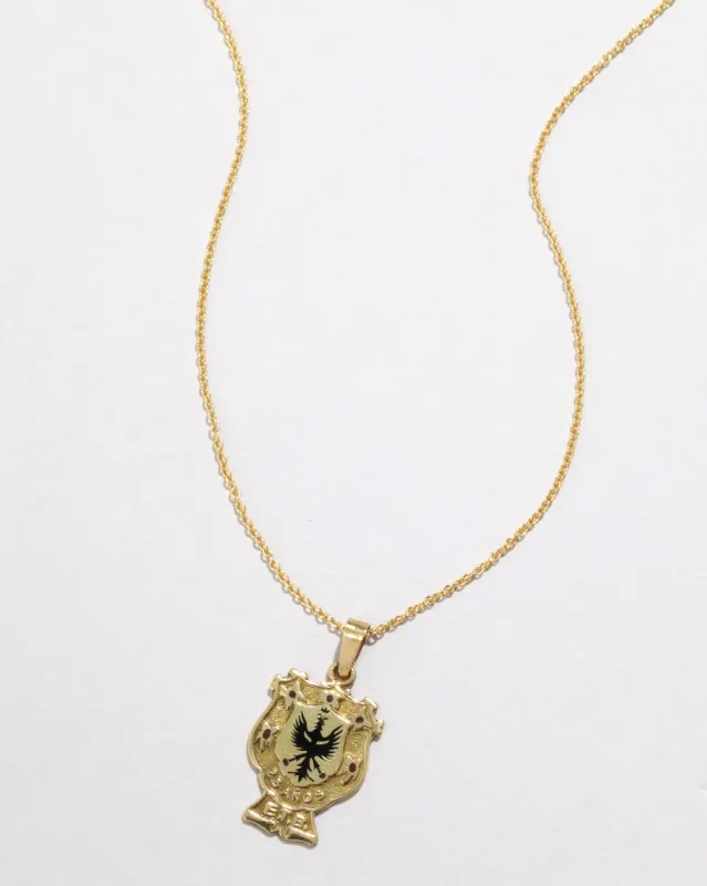 Antique 1920s 18k Gold Enameled Crest Pendant Necklace sold by Alexis Bittar