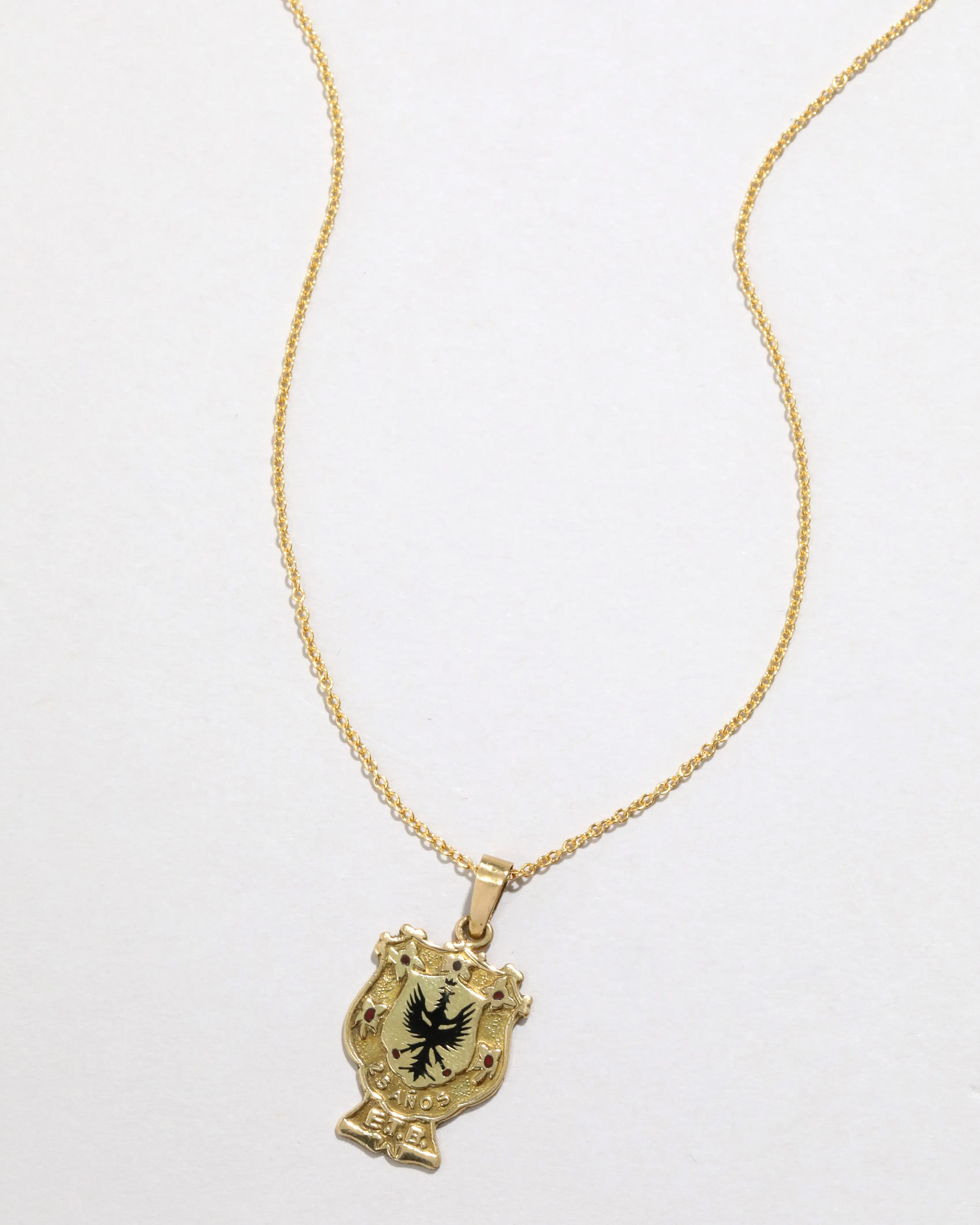 Antique 1920s 18k Gold Enameled Crest Pendant Necklace sold by Alexis Bittar