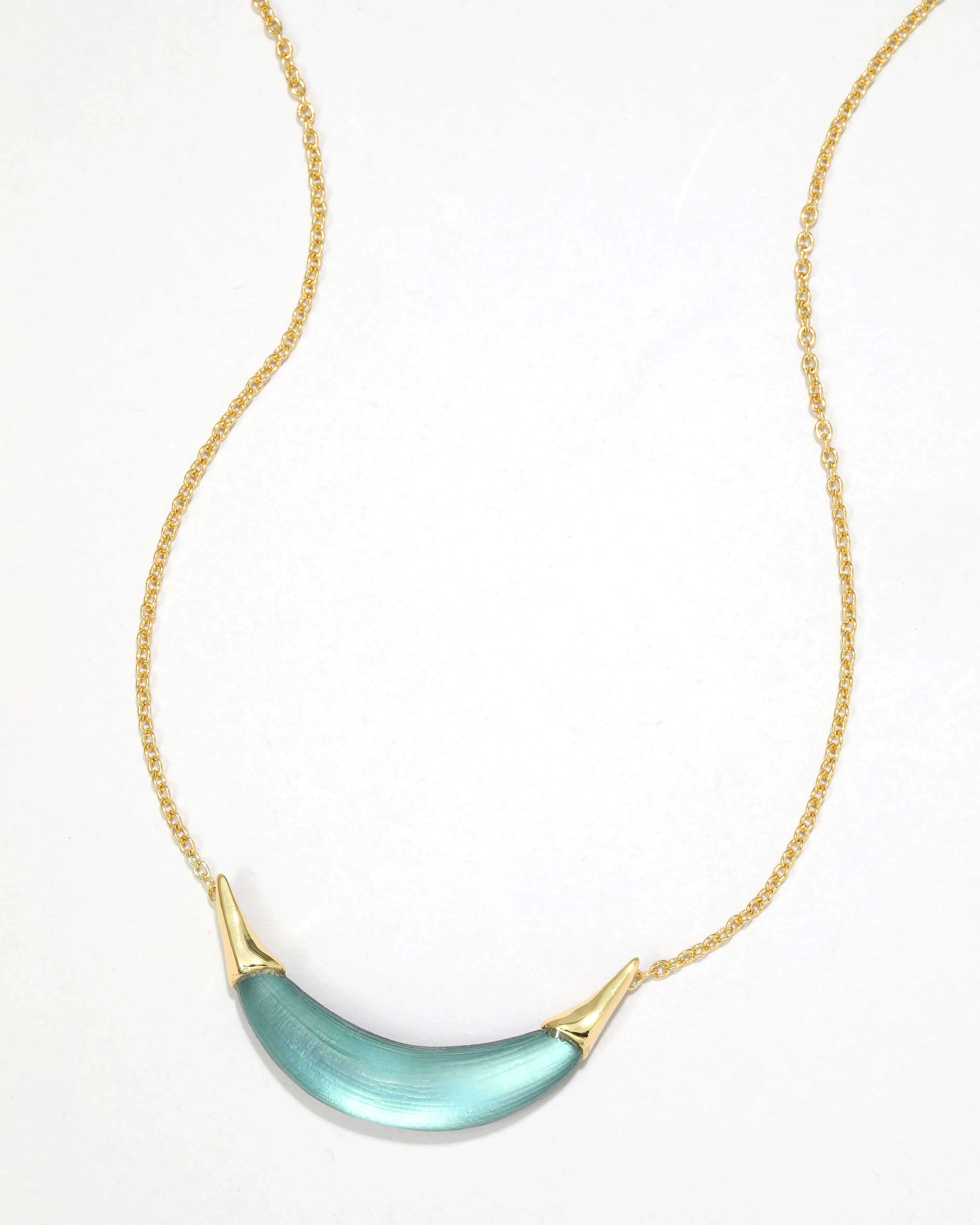 Gold Capped Crescent Lucite Necklace- Teal Blue sold by Alexis Bittar