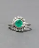 Vintage 1950s 14k White Gold Emerald & Diamond Halo Ring sold by Alexis Bittar