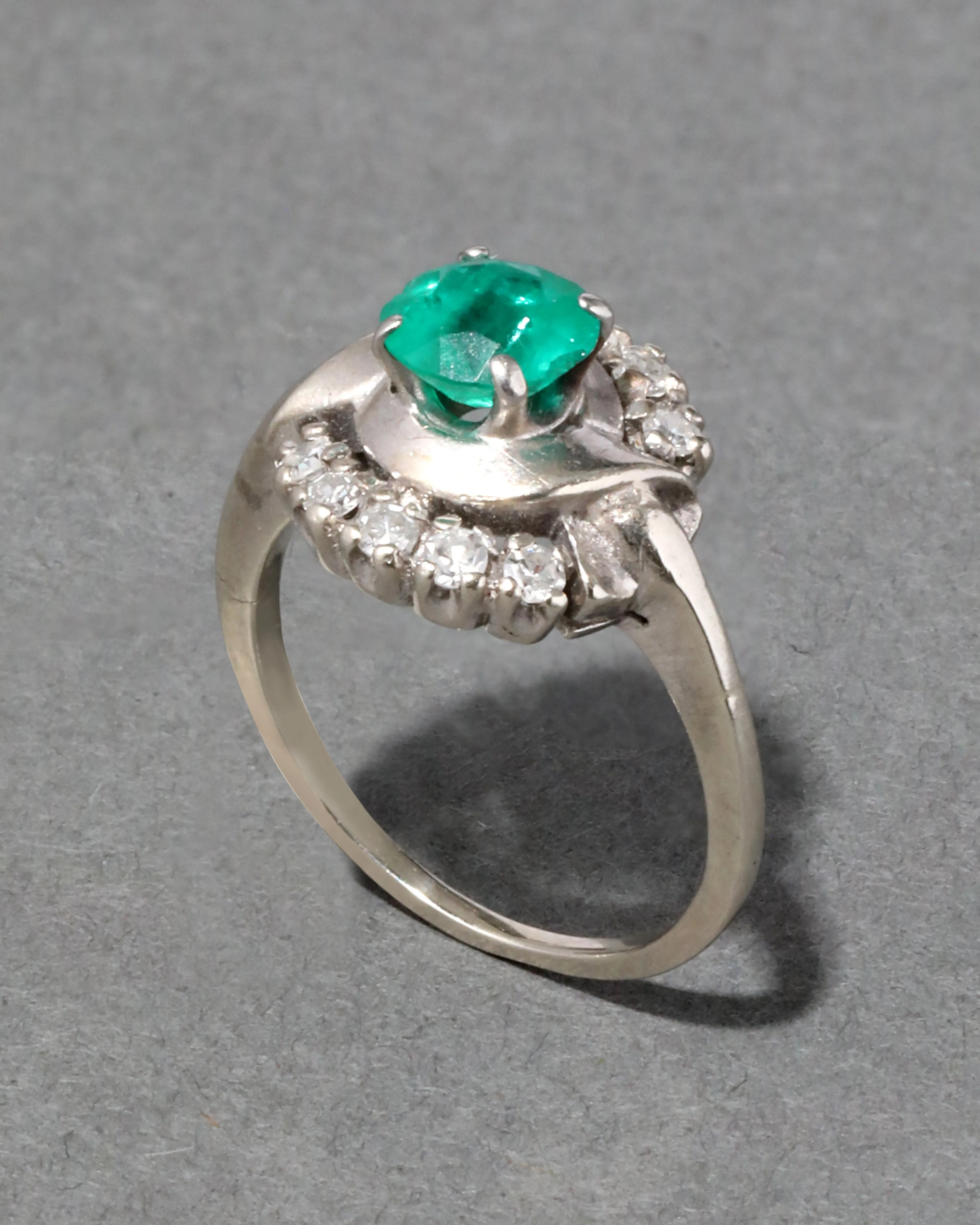 Vintage 1950s 14k White Gold Emerald & Diamond Halo Ring sold by Alexis Bittar