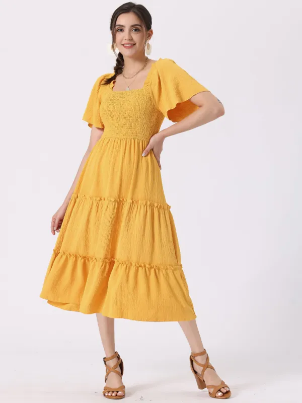 Boho Flutter Short Sleeve Tiered Flowy Midi Smocked Dress sold by Allegra K