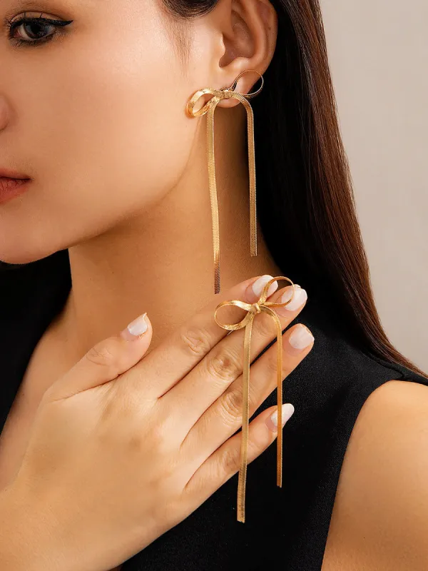 Alloy Faux Pearl Rhinestones Bow Shape Stud Earrings sold by Allegra K