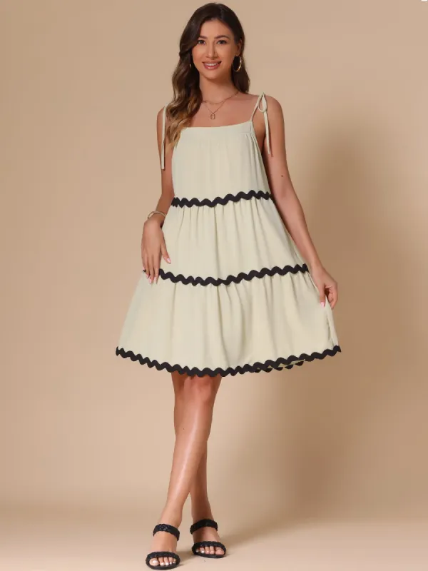 Spaghetti Strap Pocketed Contrast Trim Tiered A-Line Dress sold by Allegra K