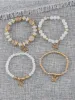 Bohemian Multi-Layered Beaded Butterfly Pendant Bracelets sold by Allegra K