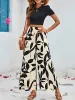 2 Pieces Solid Color Cropped Top & Graphic Wide Legs Pants Set sold by Allegra K