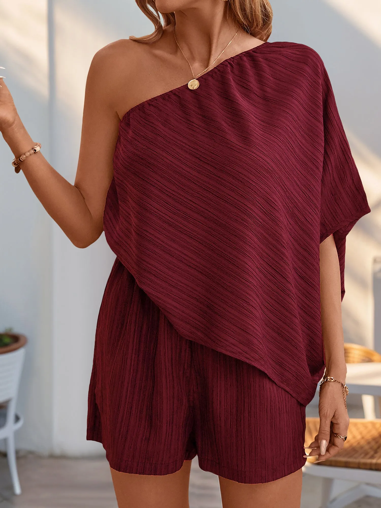Textured One Shoulder Solid Color Rompers sold by Allegra K