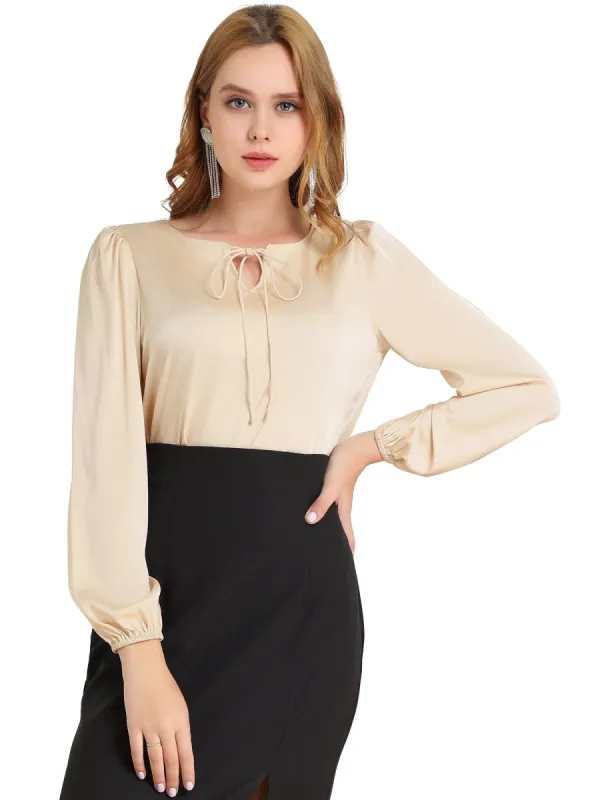 Women's Tie Neck Split Neck Long Puff Sleeve Elastic Cuff Solid Top sold by Allegra K