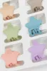 Multi 9 Pack Star Claw Clips sold by Ally Fashion